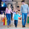 pngtree-young-family-with-shopping-bags-holding-modern-children-photo-image_42750434